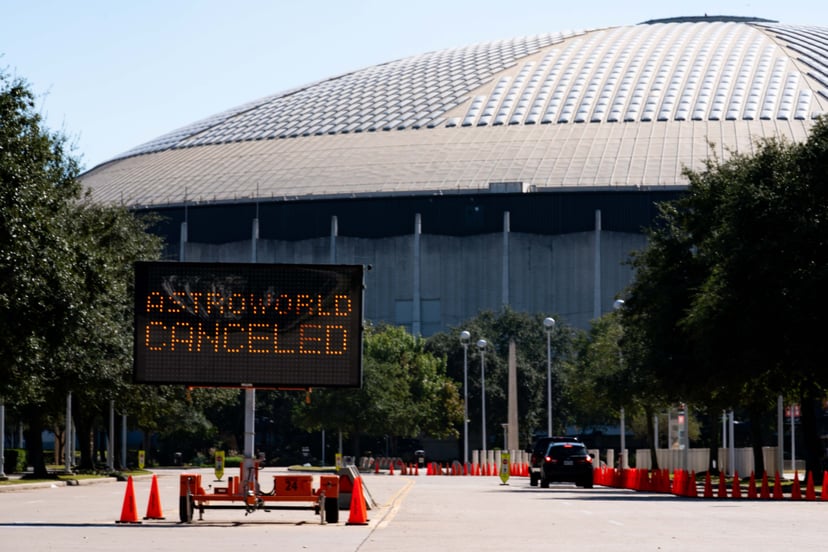 HOUSTON, TX - NOVEMBER 06: A street sign showing the cancellation of the AstroWorld Festival at NRG Park on November 6, 2021 in Houston, Texas. According to authorities, eight people died and 17 people were transported to local hospitals after what they d
