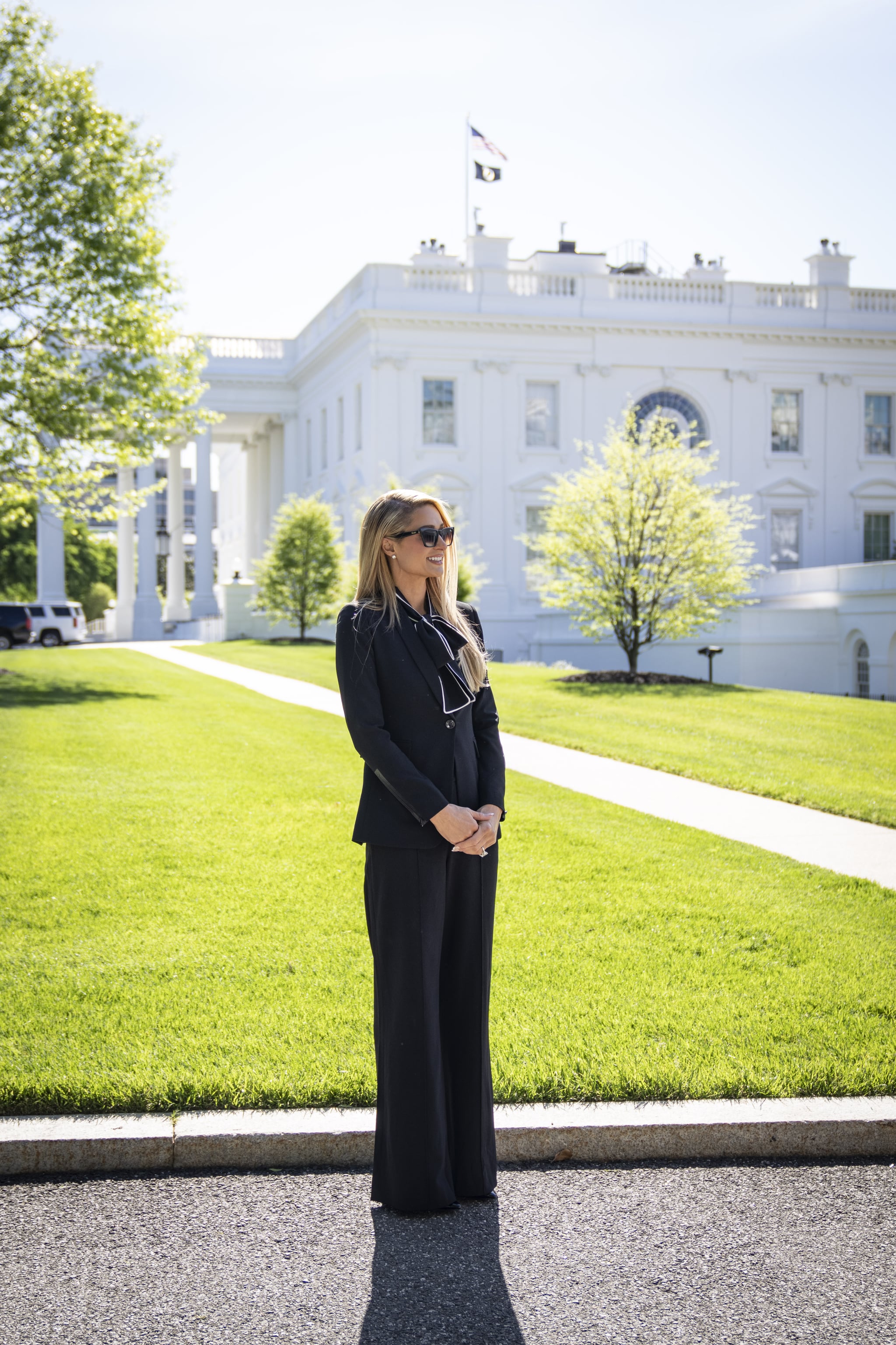 WASHINGTON, DC - MAY 10:  Actress and model Paris Hilton stands outside the White House on May 10, 2022 in Washington, DC. Hilton and her husband Carter Reum visited the White House to meet with Biden administration officials regarding child abuse laws. (Photo by Drew Angerer/Getty Images)