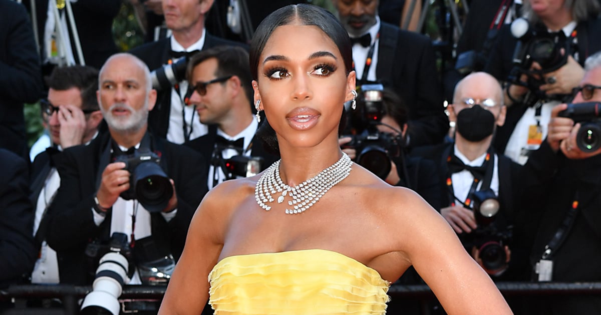 Lori Harvey Hits the Red Carpet at Cannes in a Strapless Yellow Ballgown.jpg