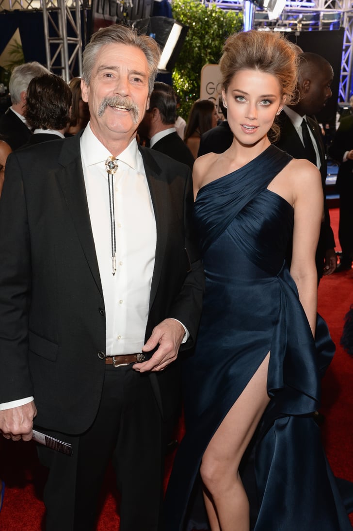 Amber Heard posed with her dad, David, on the red carpet at the