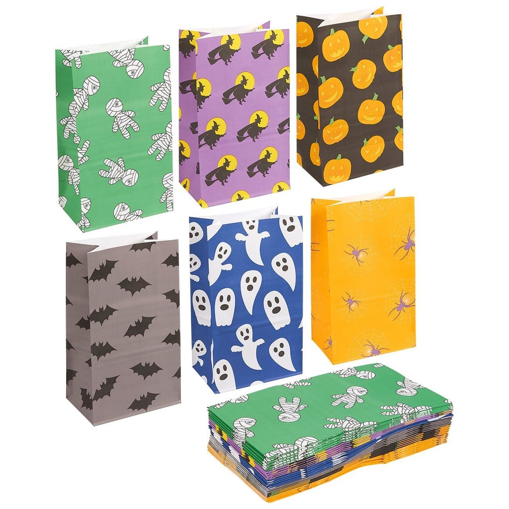 Whether you're incorporating a DIY candy station into the party or sending guests home with goodies, these adorable Halloween Party Treat Bags ($9) are just the thing.