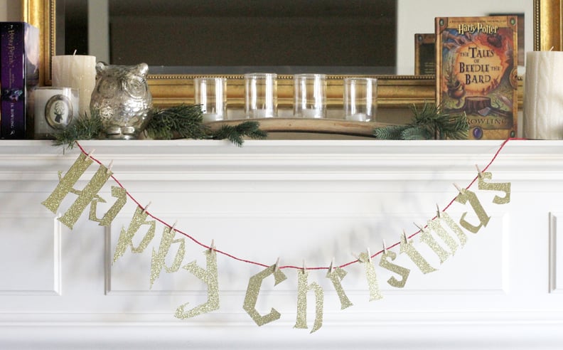 Set the scene with a Happy Christmas sign.