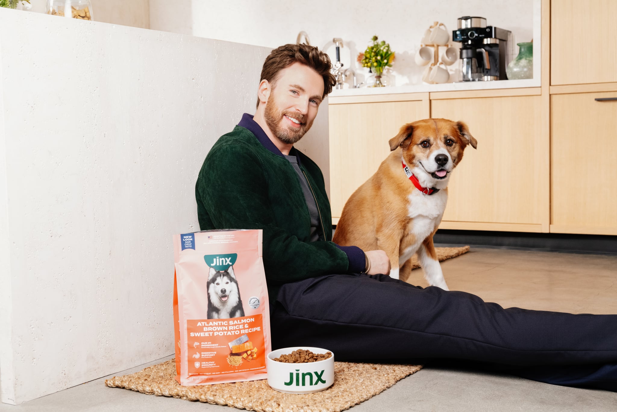 Chris Evans With Dog Dodger on Kitchen Ground