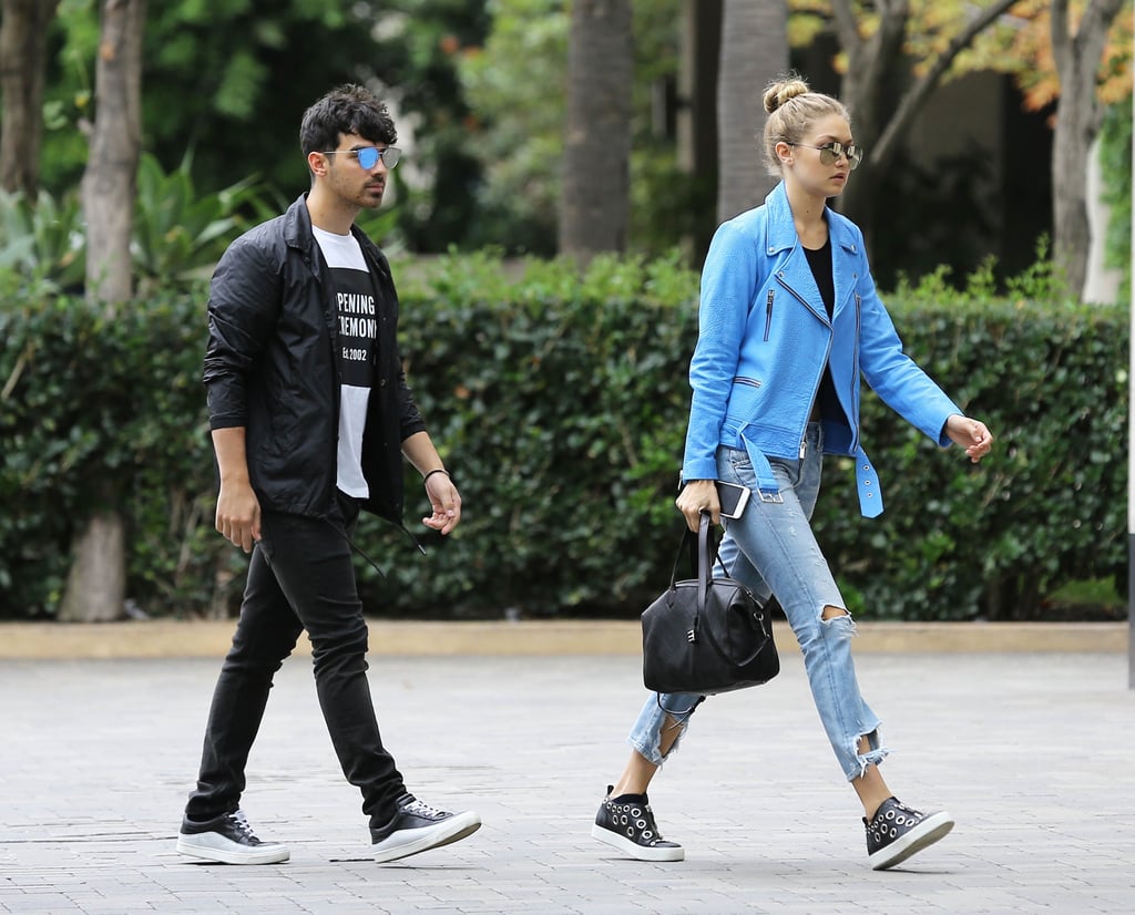 When Joe Wore Sunglasses That Reflected the Electric Color of Gigi's Moto Jacket