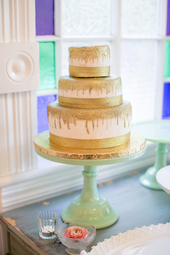 The sparkly gold details on this cake are so unexpected and fun — what else could you ask of your wedding-day dessert?
