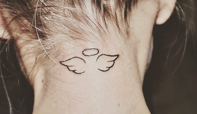 anatomically correct angel wings tattoo