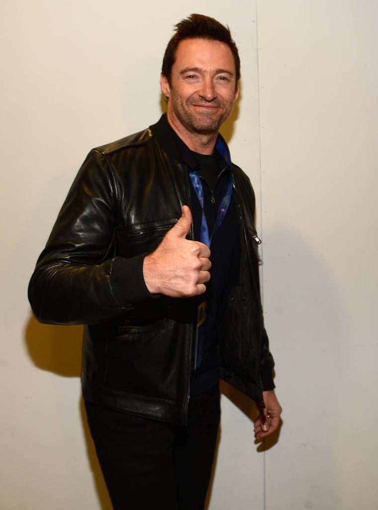 Hugh Jackman gave a thumbs-up at the Super Bowl pregame show.