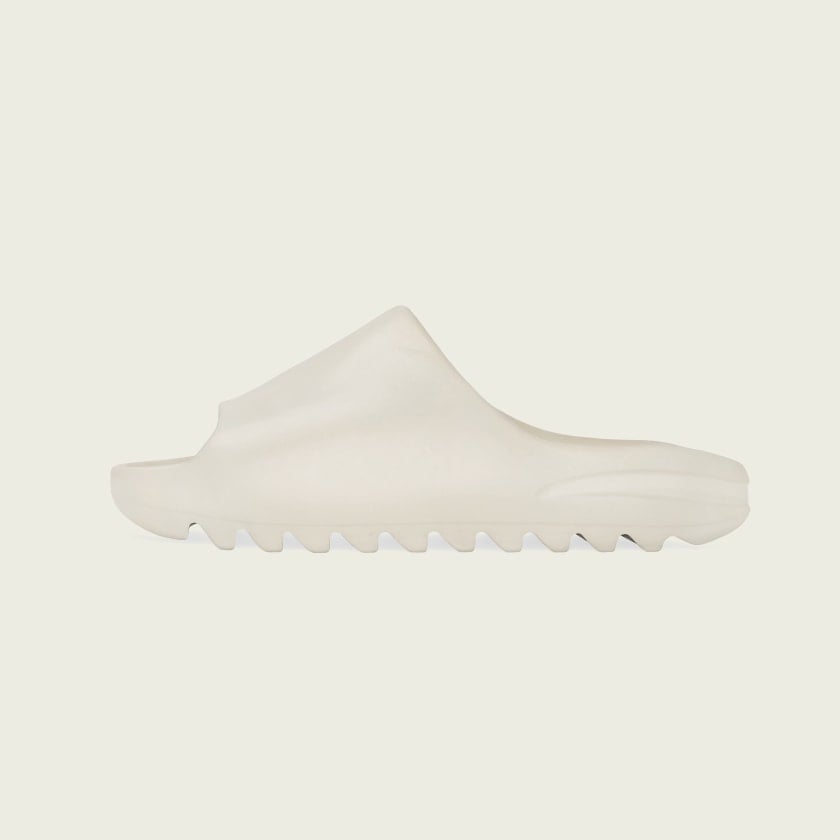 Adidas + Kanye West Yeezy Slides in Bone | The New Yeezy Slides Are ...