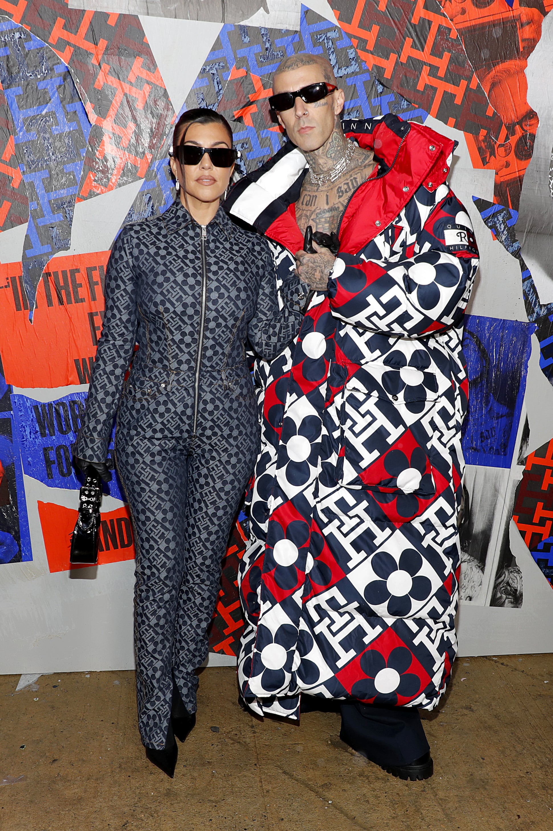 BROOKLYN, NEW YORK - SEPTEMBER 11: Kourtney Kardashian and Travis Barker attend Tommy Factory New York Fall 2022 at Skyline Drive-In on September 11, 2022 in Brooklyn, New York. (Photo by Astrid Stawiarz/Getty Images for Tommy Hilfiger)