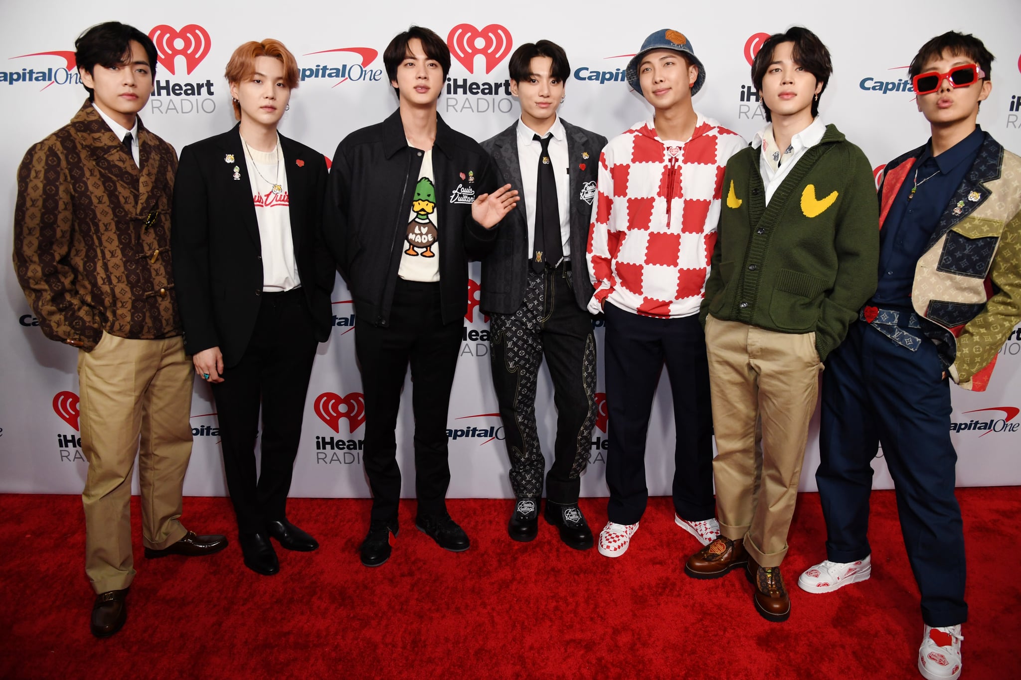 INGLEWOOD, CALIFORNIA - DECEMBER 03: (EDITORIAL USE ONLY) (L-R) V, Suga, Jin, Jungkook, RM, Jimin, and J-Hope of BTS attend iHeartRadio 102.7 KIIS FM's Jingle Ball 2021 presented by Capital One at The Forum on December 03, 2021 in Los Angeles, California. (Photo by Kevin Mazur/Getty Images for iHeartRadio)