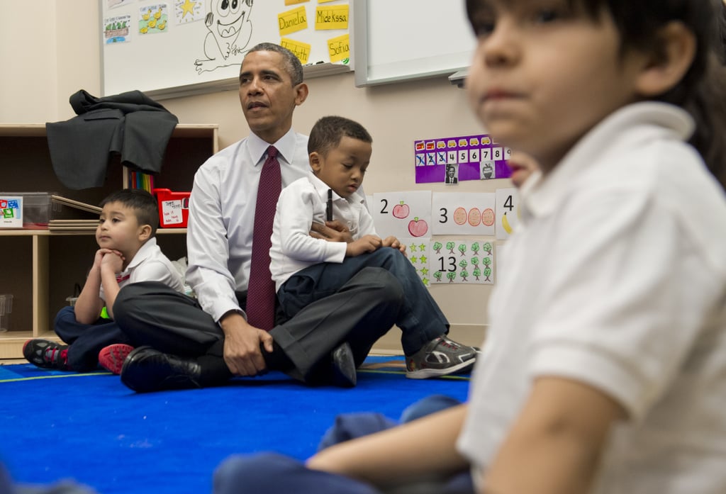 Partaking in story time during a 2014 visit to an elementary school in DC.