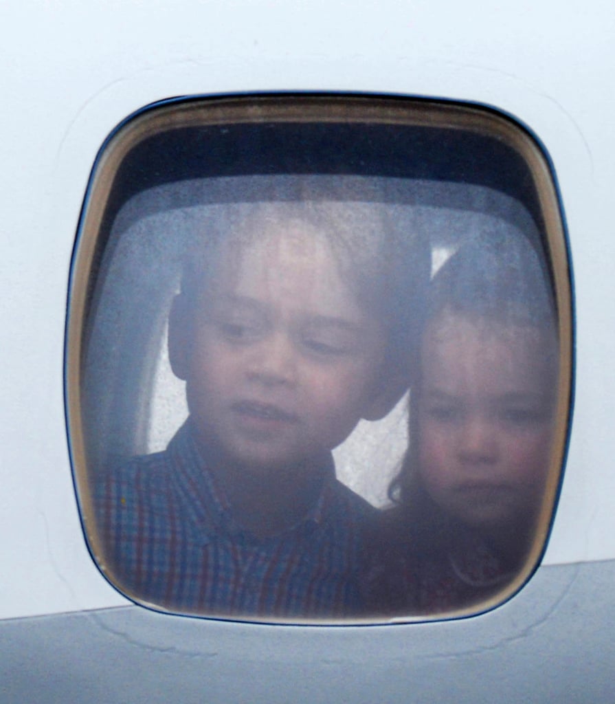 George and Charlotte Looking Out of Plane Windows Pictures