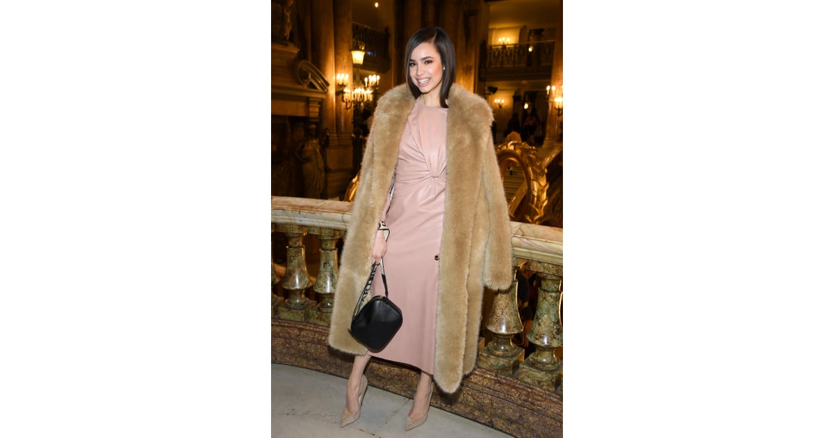 Wearing a blush Stella McCartney dress and faux-fur coat at the | Sofia ...