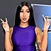 Not Even Stiletto Nails Can Stop Cardi B From Changing Diapers Like a Pro