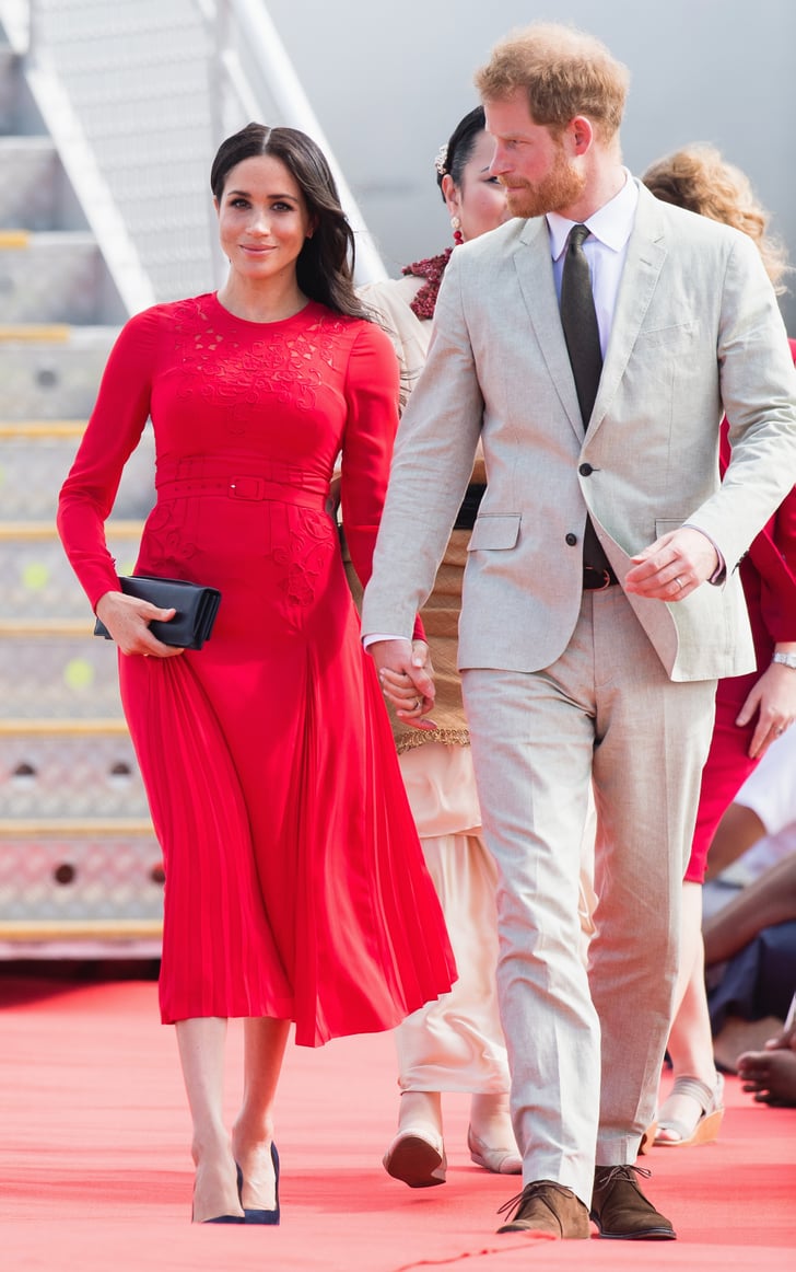 Meghan showed off her growing baby bump during the 2018 tour in this bright red Self-Portrait number when she touched down in Tonga with Prince Harry.