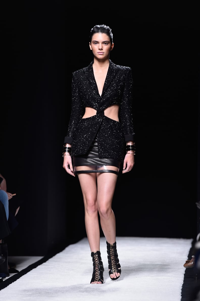 NYFW: Kendall Jenner pairs plaid mini dress and fur coat