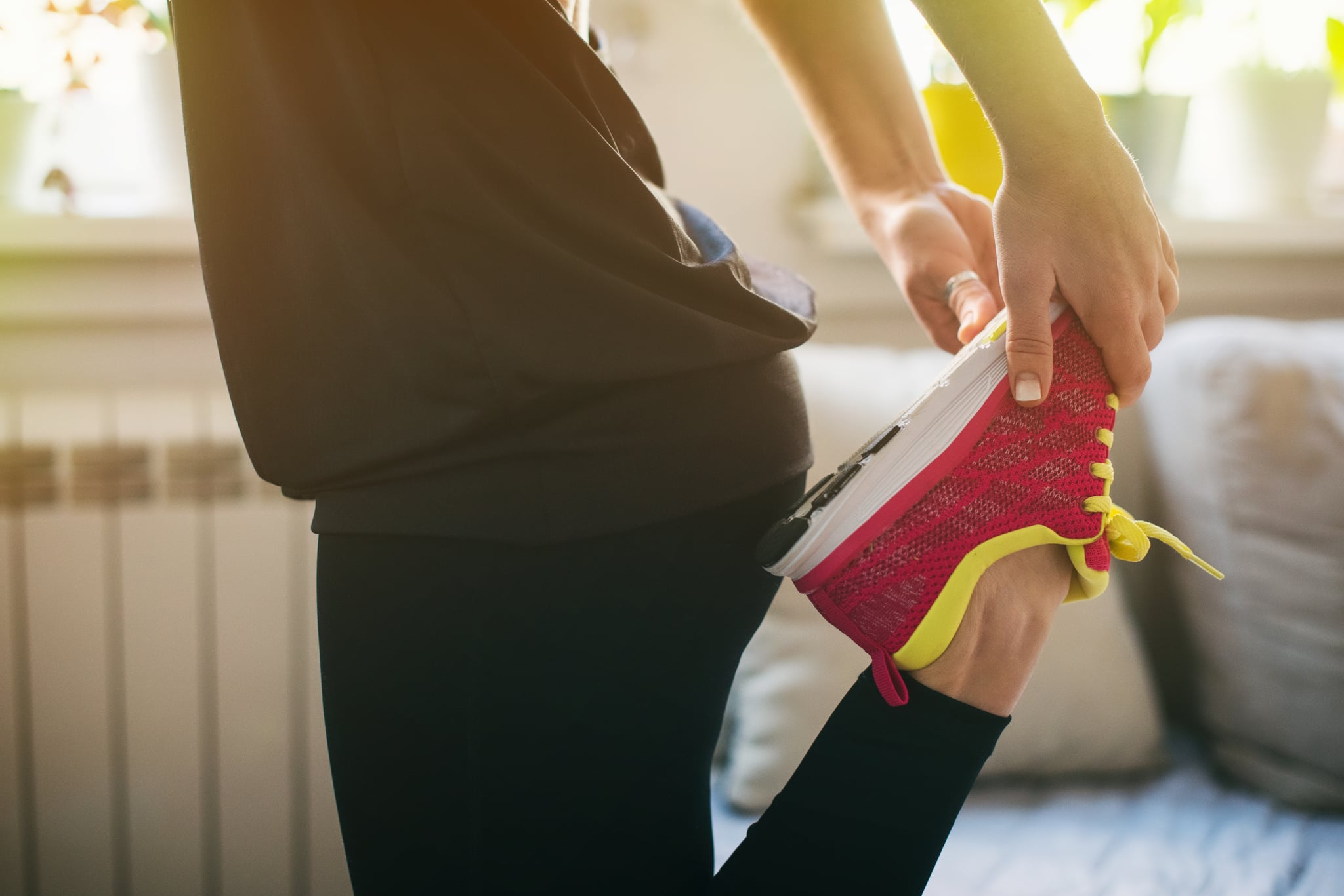 Young woman getting ready for morning exercising