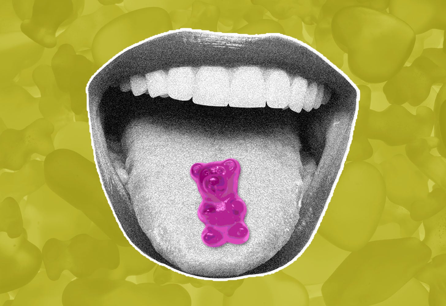 Open mouth with purple gummy on the tongue.