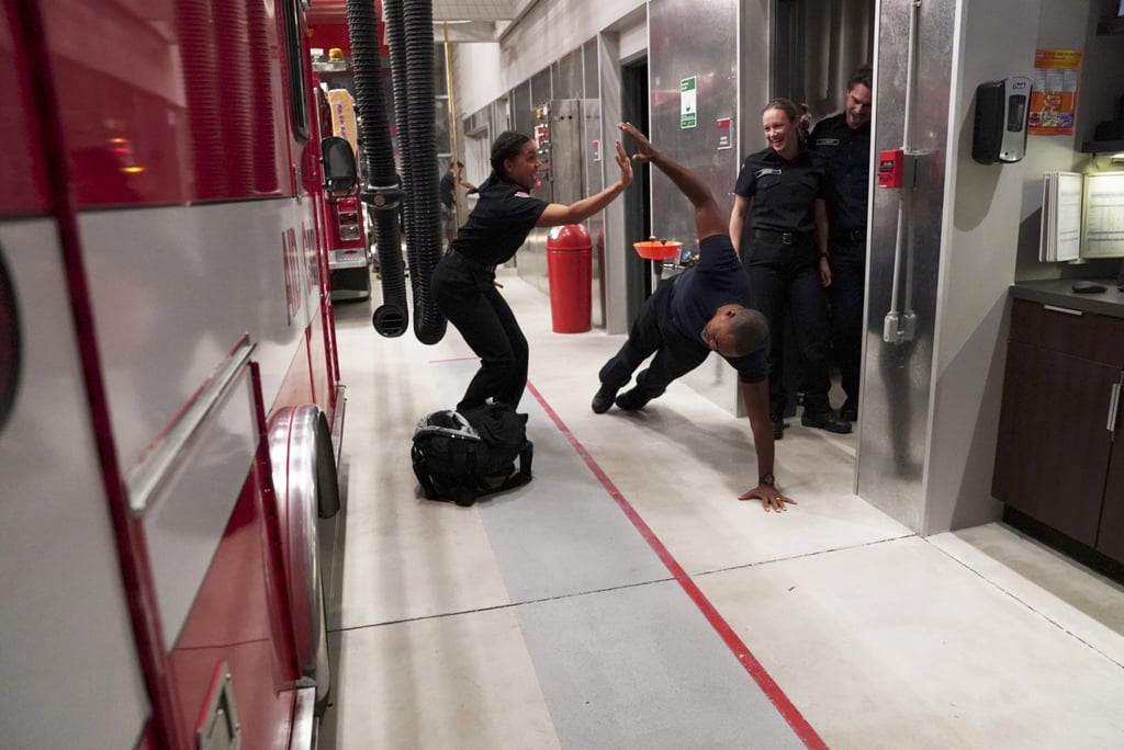 Ben bangs out a few one-armed push-ups in the firehouse, as one does.