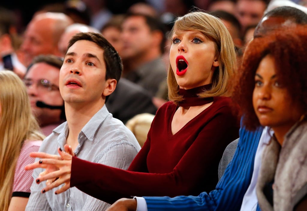 Taylor Swift's signature surprised face took on a different tone as she sat courtside for a Knicks game in November 2014.
