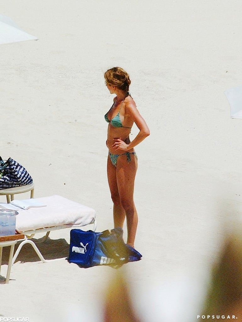 Jennifer showed off her hot figure while relaxing in the sand in Mexico in July 2003.