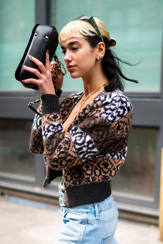 Dua Lipa Reveals Her New Bangs Are Due to Bleach Damage Dua Lipa Reveals Her New Bangs Are Due to Bleach Damage