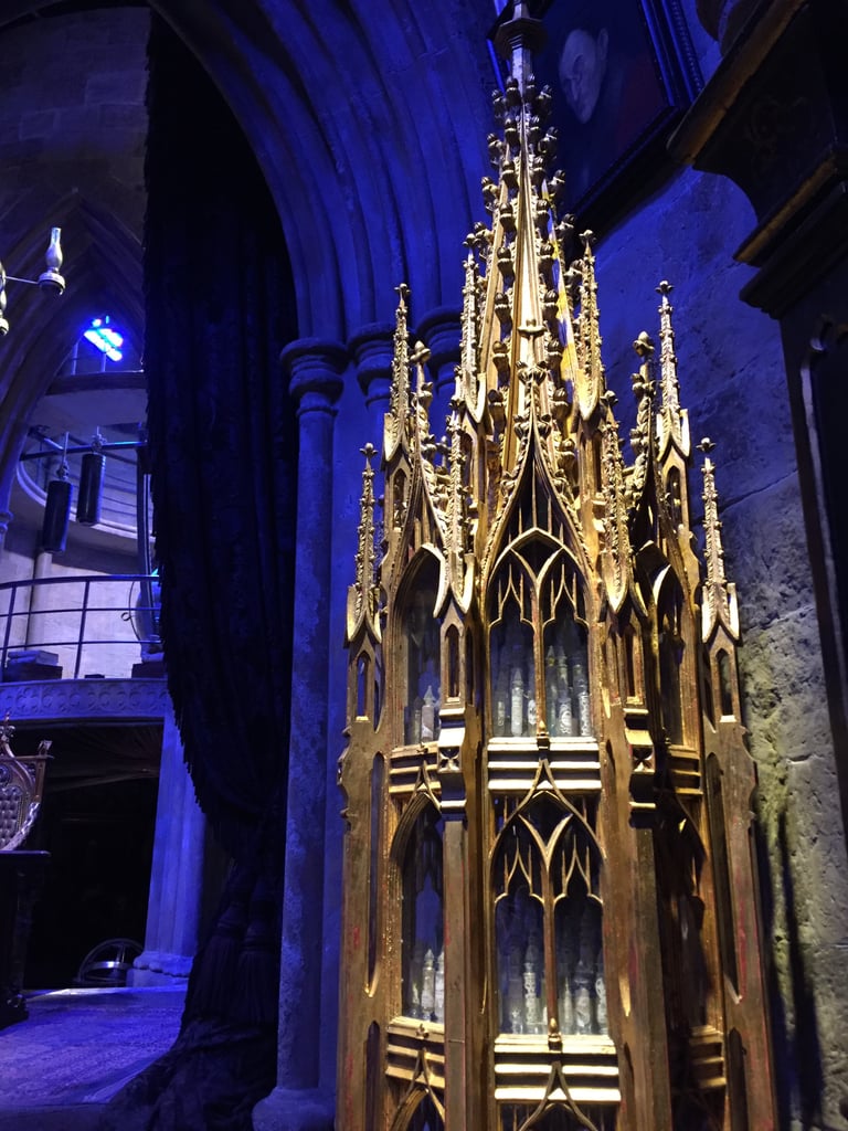 Here's Dumbledore's beautifully intricate memory vial cabinet.