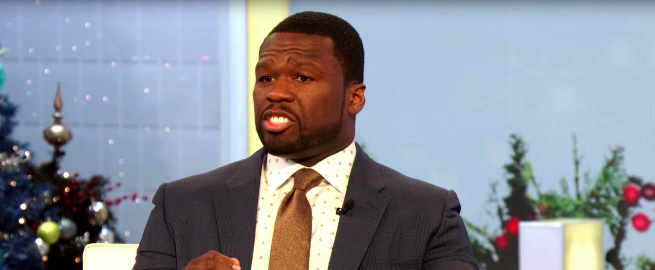 50 Cent Describes His First Attempt at Yoga POPSUGAR Fitness