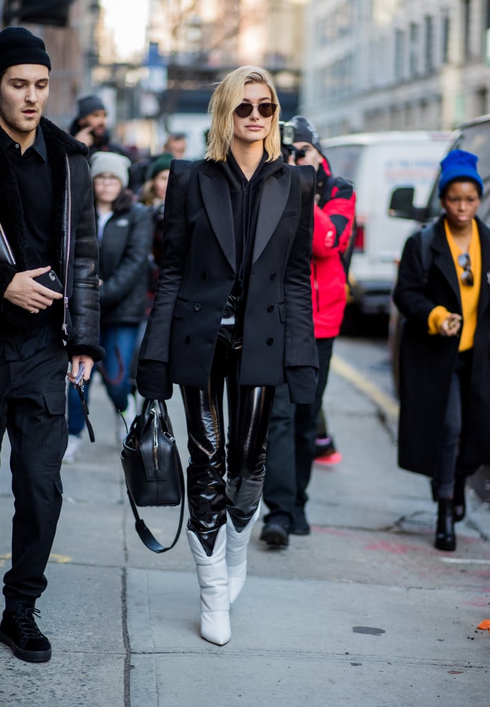 Hailey worked a pair of white Off-White x Jimmy Choo boots (also owned by Rihanna, BTW) with Yeezy leather skinnies, a Danielle Guizio hoodie, Oliver Peoples sunglasses, and a sophisticated Barbara Bui blazer in February.