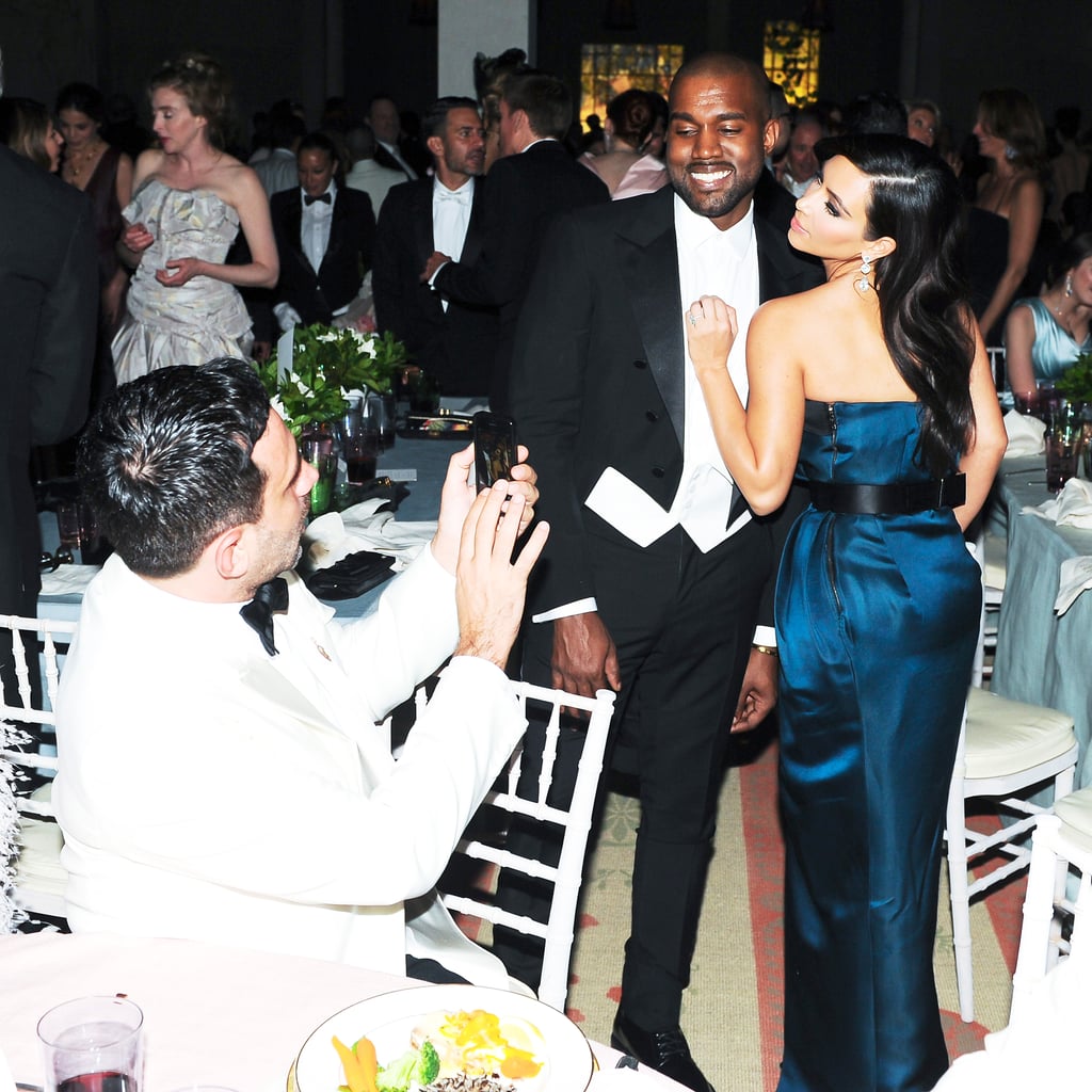 Kim Kardashian struck a pose with Kanye West during dinner.