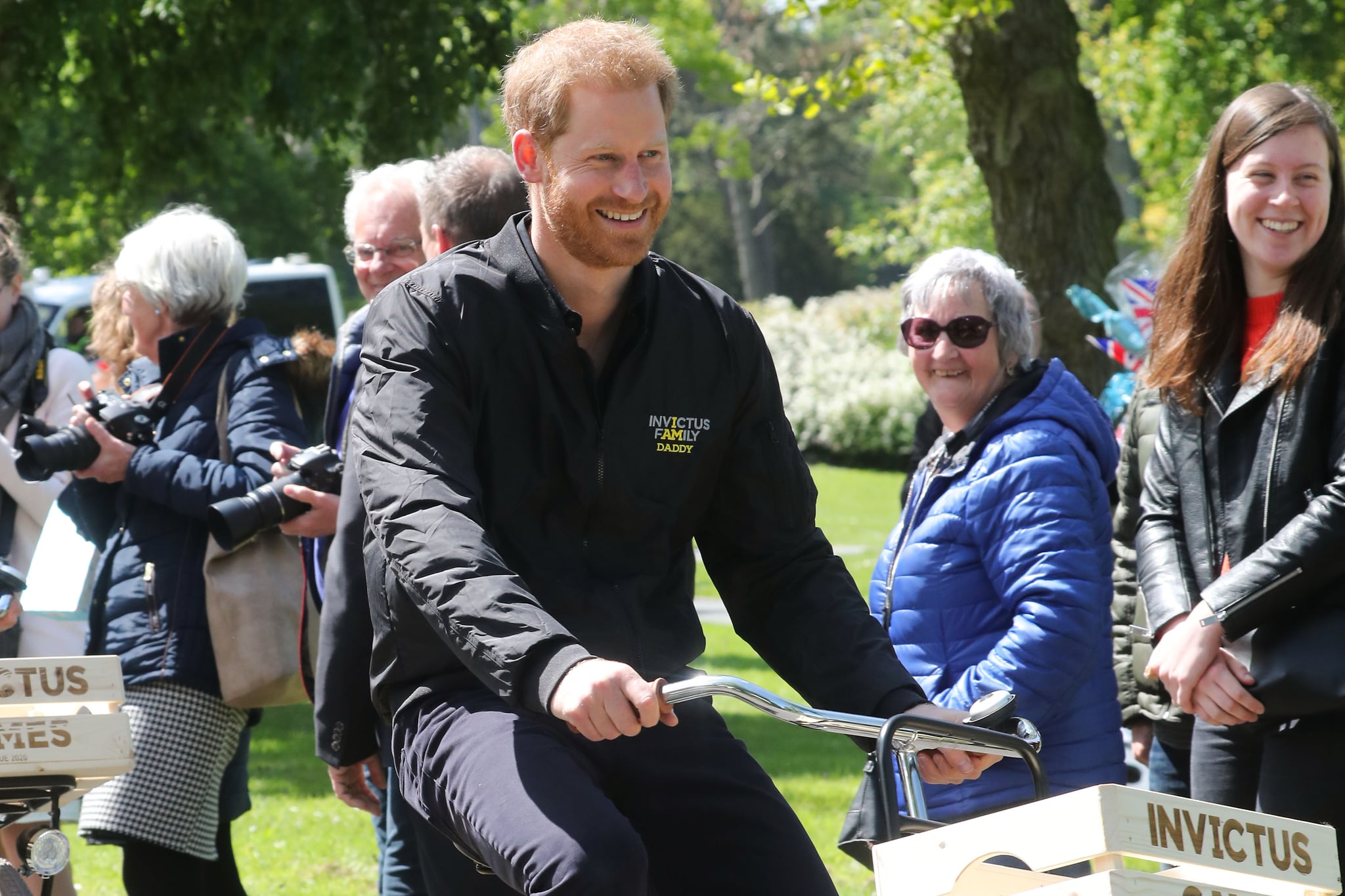 THE HAGUE, NETHERLANDS - MAY 09: Prince Harry, Duke of Sussex mounts a bike for the next part of the tour at Sportcampus Zuiderpark during a visit to The Hague as part of a programme of events to mark the official launch of the Invictus Games. HRH will spend time meeting potential competitors and their families, joining the Netherlands in celebrating what an exciting event The Hague 2020 will be. Prince Harry, Duke of Sussex founded the games in 2014 in which wounded veterans compete in an array of sporting events on May 09, 2019 in The Hague, Netherlands. (Photo by Chris Jackson/Getty Images)