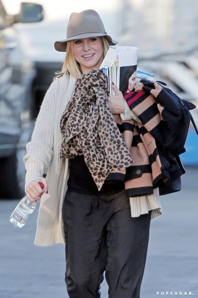 Kristen Bell covered up her baby bump on the LA set of House of Lies on Monday.