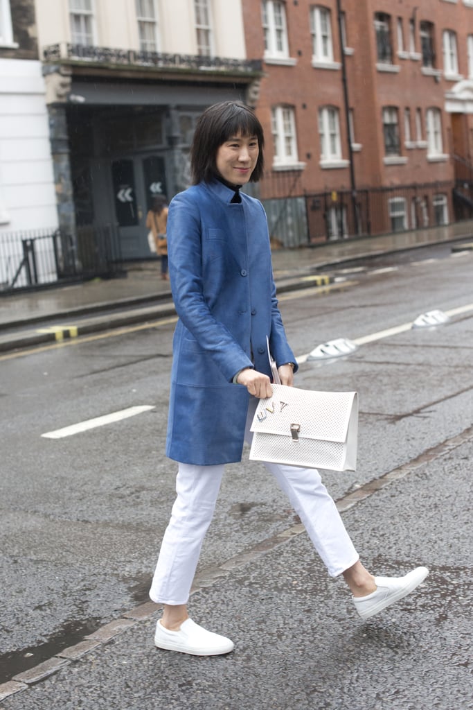 With a Light Blue Coat and Casual Slip-Ons