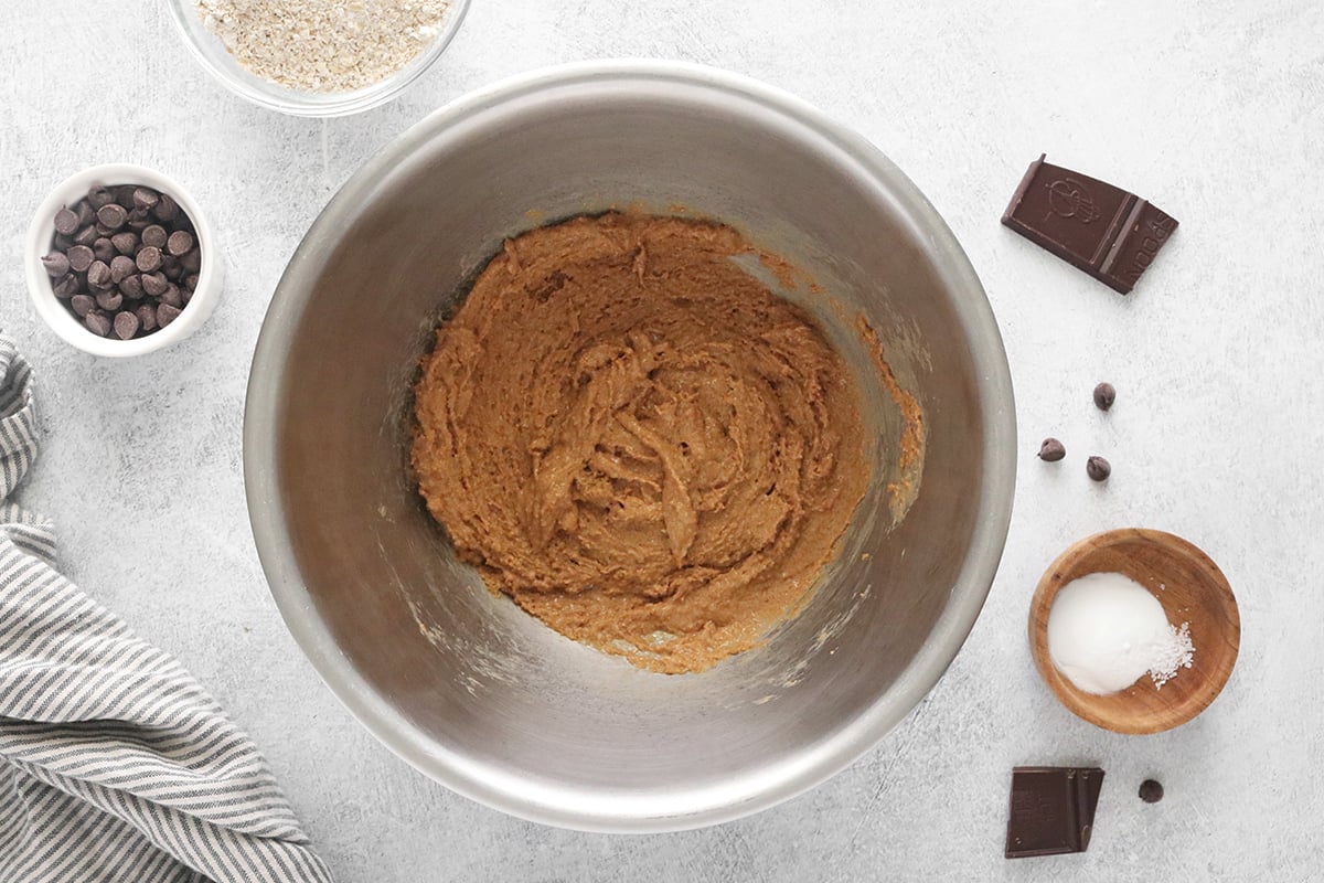 Mixing brown sugar and peanut butter in a large bowl