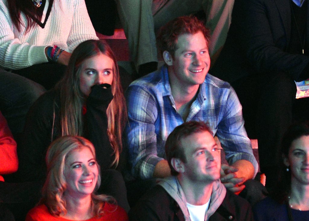 Prince Harry and his girlfriend, Cressida Bonas, got cozy at the We Day UK charity event at Wembley Arena in London on Thursday.