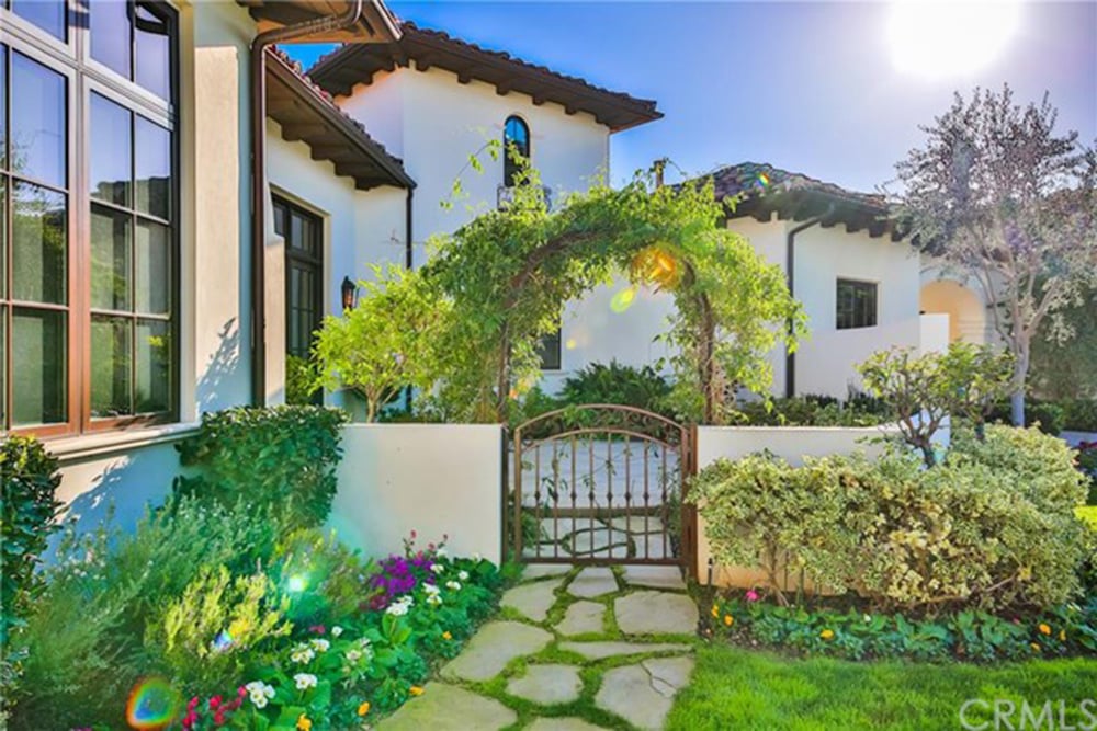 Luscious greenery dots the property.
