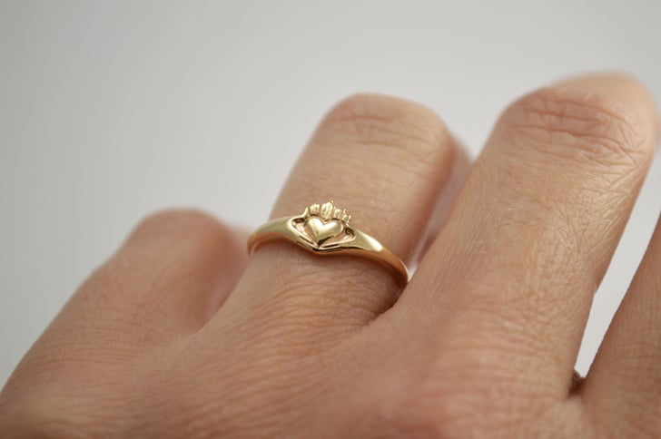 Hands heart shop crown ring meaning