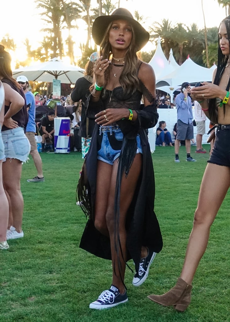 Jasmine Tookes Wearing A Lace Bustier Cardigan Denim Shorts And Coachella Fashion 2017