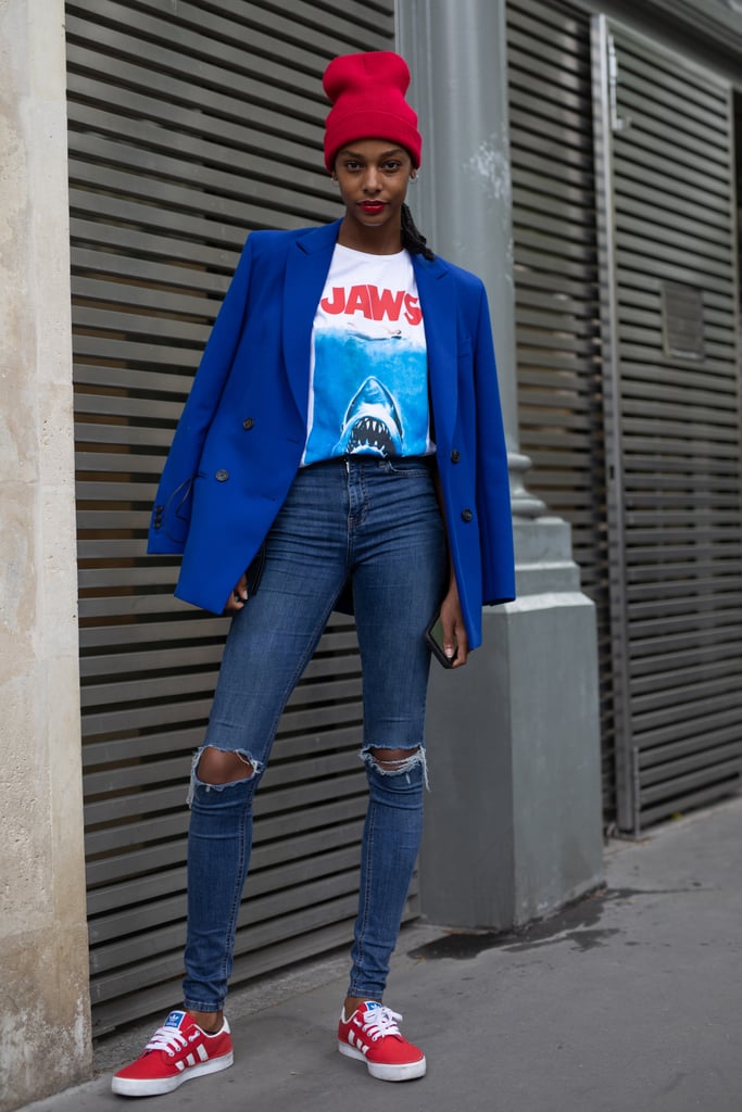 Keep it casual with distressed skinnies and a graphic tee. Add a pair of brightly coloured sneakers and a beanie, but keep up the elegance factor with a blazer draped over your shoulders.