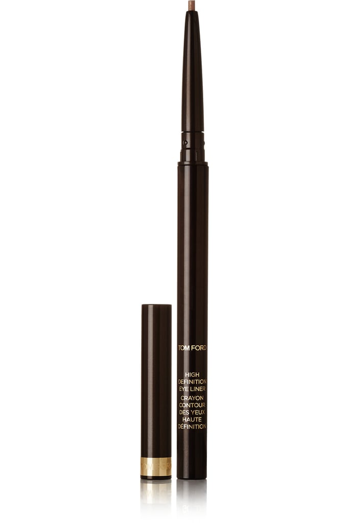 At the end of the tutorial, Kim applied a bronze eyeliner at her waterline. As an option, try Tom Ford's Tom Ford High Definition Eye Liner ($42) in Burnished Gold.