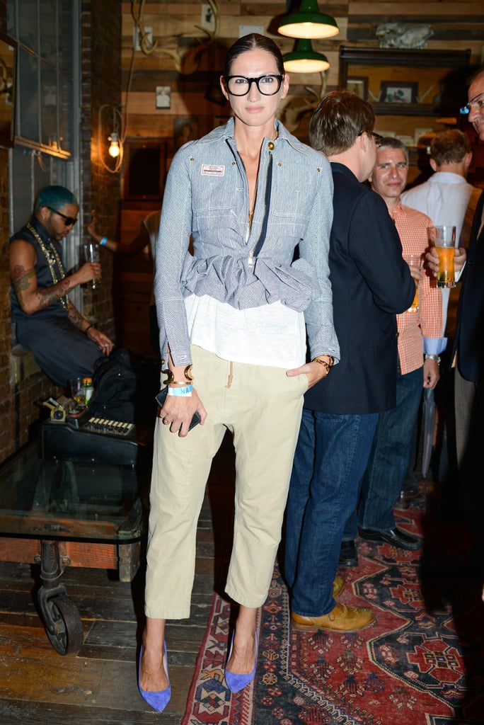 We'd never laid eyes on drop-waist khakis before uncovering this shot, but we're starting to want a pair (a regular occurrence with this street style star). Railroad stripes and colorful pumps combine for an all-around great look. We'd never laid eyes on drop-waist khakis before uncovering this shot, but we're starting to want a pair (a regular occurrence with this street style star). Railroad stripes and colorful pumps combine for an all-around great look.
