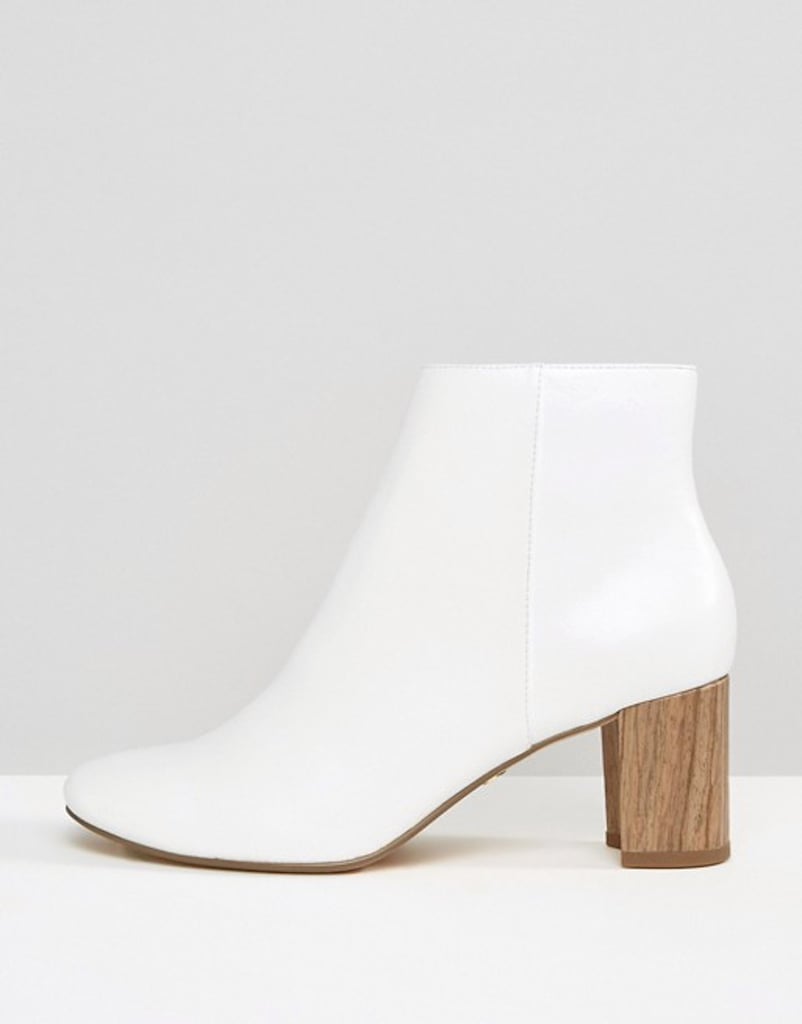 Opt for wood heels, like these KG Delia Boots ($227), for a hit of boho that breaks up the mod white look.