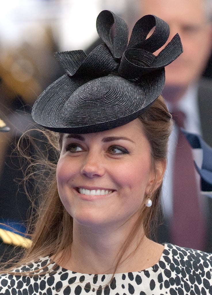 The duchess topped her animal-print dress with a solid Sylvia Fletcher hat for Lock & Co.