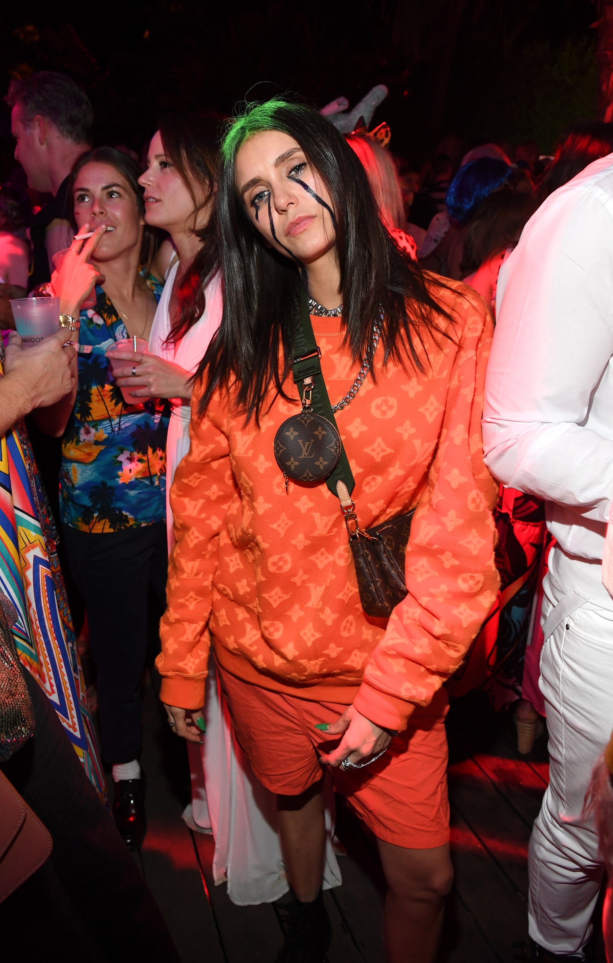 Nina Dobrev Wearing Louis Vuitton For Her Billie Eilish Halloween Costume, Nina Dobrev's Billie Eilish Halloween Costume Wouldn't Be Complete Without Louis  Vuitton