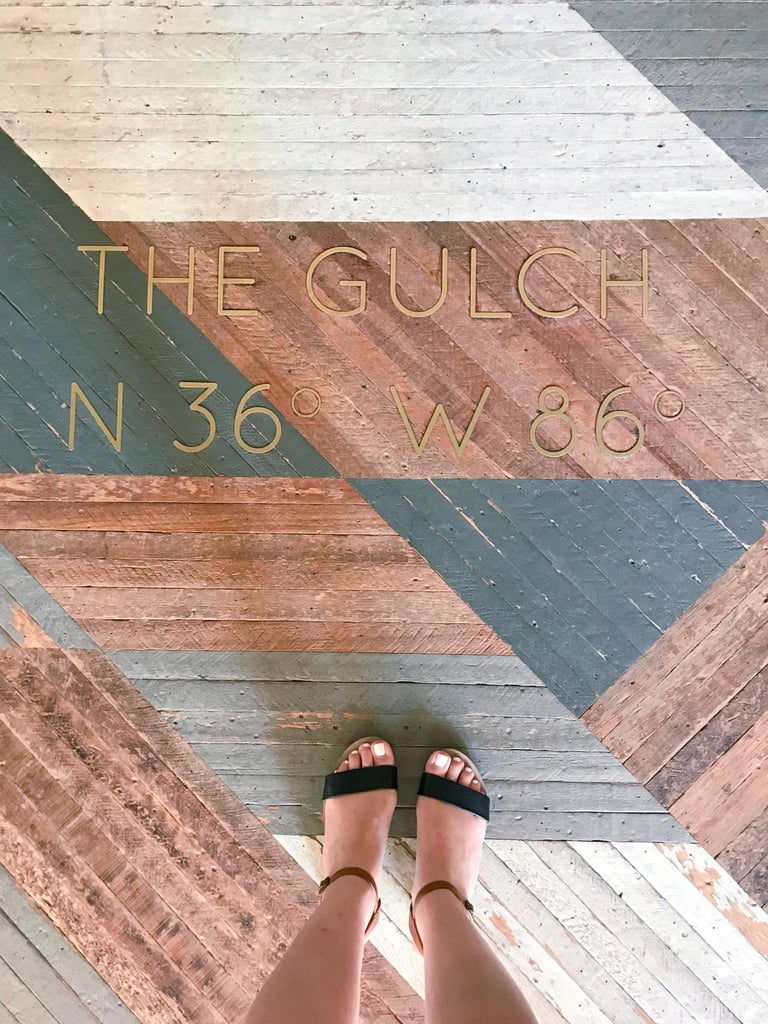One of the first things you'll notice when you walk into the Thompson is the wood floor mosaic, featuring the geographic coordinates of the hotel. The Instagrammable spot was designed by local artist Patrick Hayes of 1767 and made from reclaimed wood from old homes.