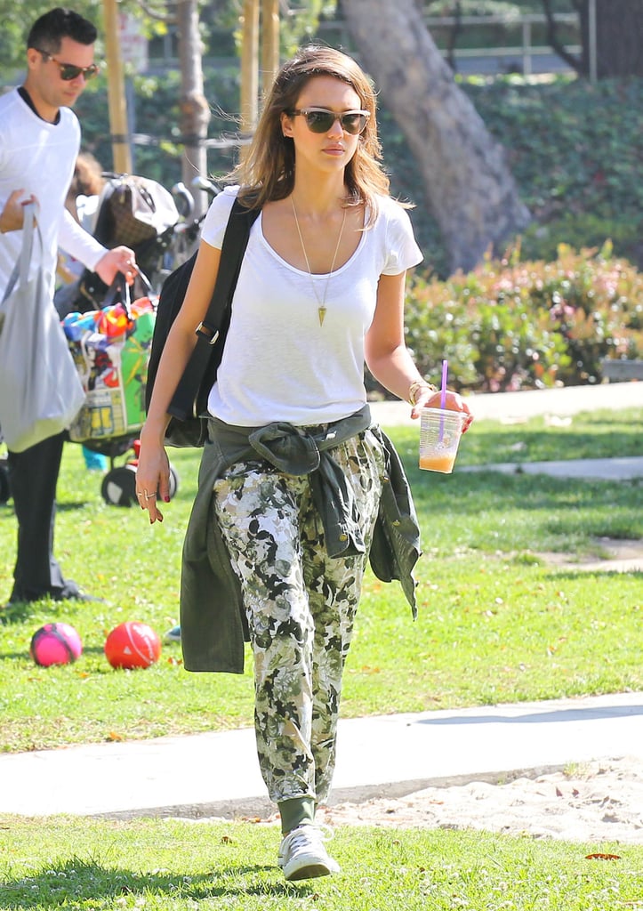 Jessica Alba in Printed Wayf Crepe Pants and Metallic Converse