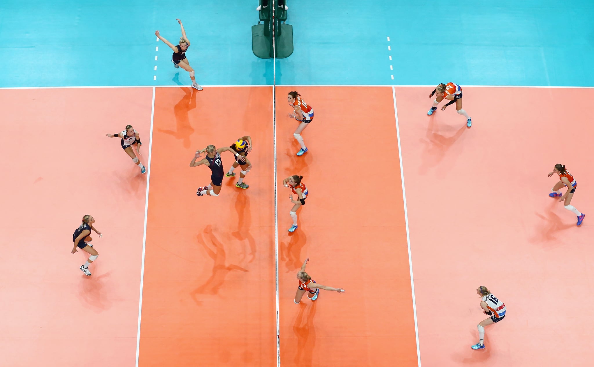 RIO DE JANEIRO, BRAZIL - AUGUST 20: Christa Harmotto Dietzen #13 of United States spikes the ball during the Women's Bronze Medal Match between Netherlands and the United States on Day 15 of the Rio 2016 Olympic Games at the Maracanazinho on August 20, 2016 in Rio de Janeiro, Brazil.  (Photo by Phil Walter/Getty Images)