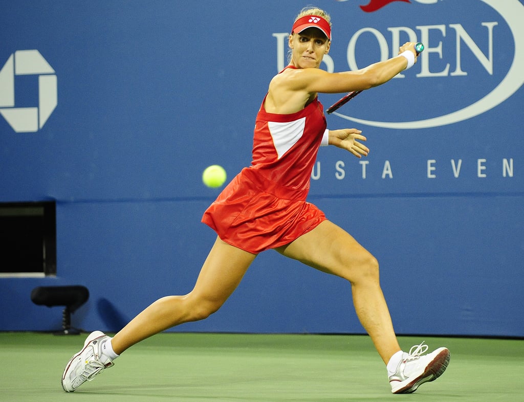Elena Dementieva wore a loose red and white tennis dress with a matching visor to the 2010 US Open.