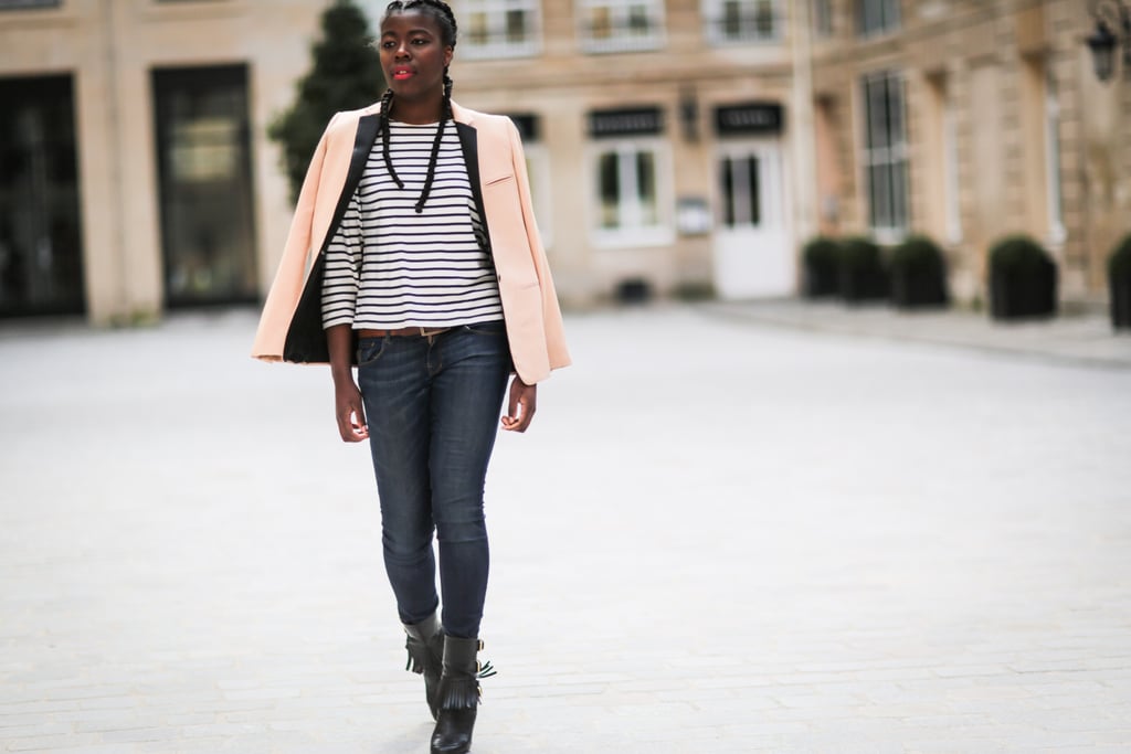 A cream-colored blazer is smart over a striped tee and jeans.