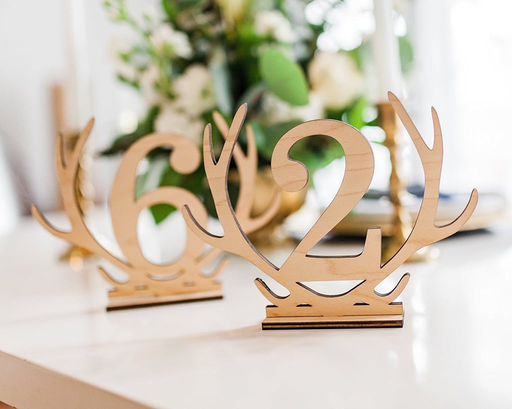 Add an edgy touch to your bohemian wedding with these antler-style wooden table numbers ($8).